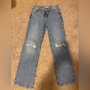 Garage Dark Wash Distressed Blue Jeans with ripped knees